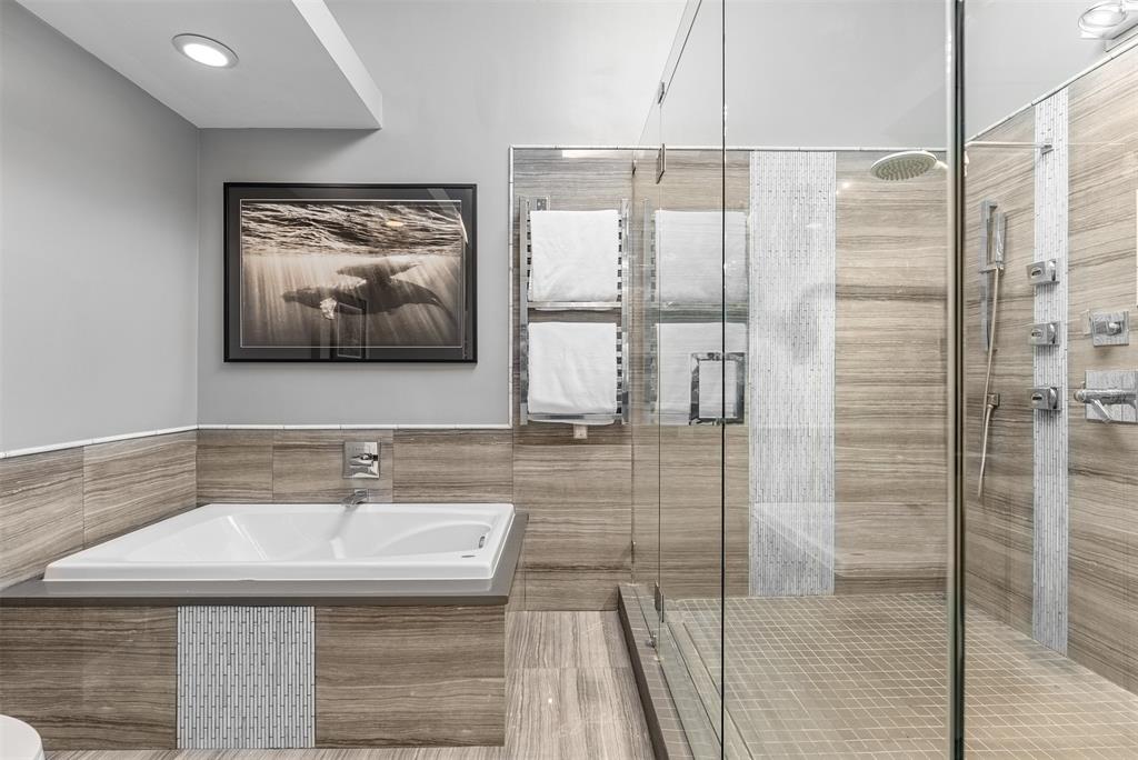 10406 Crestover Drive Dallas, TX 75229 - Photo 22 of 30 a bathroom with a sink and mirror