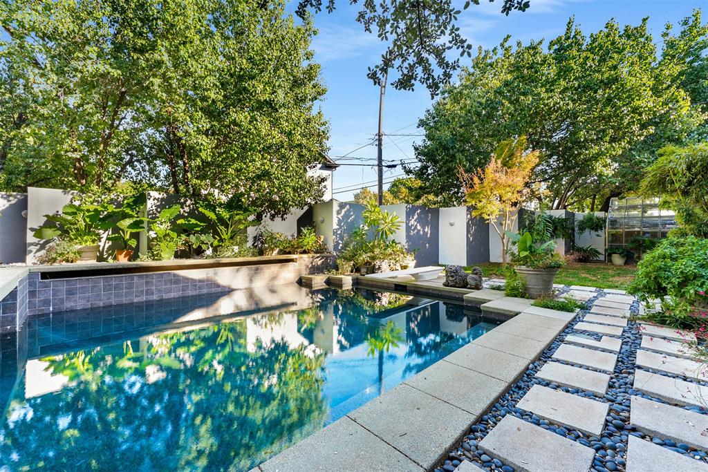 10406 Crestover Drive Dallas, TX 75229 - Photo 26 of 30 a view of a backyard with sitting area