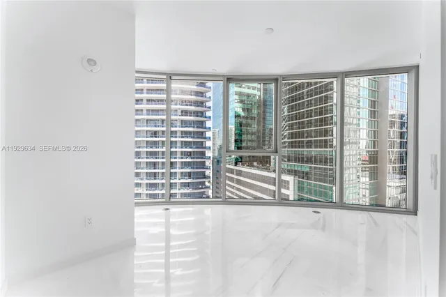 a view of a room with a large window