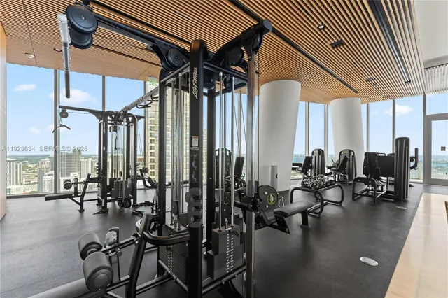 a view of a patio with table and chairs