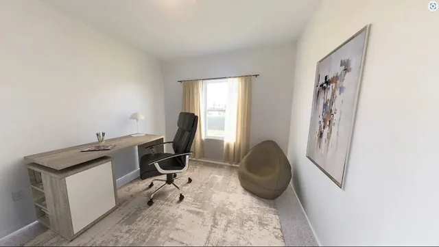 a kitchen with granite countertop a stove a sink a dining table and chairs