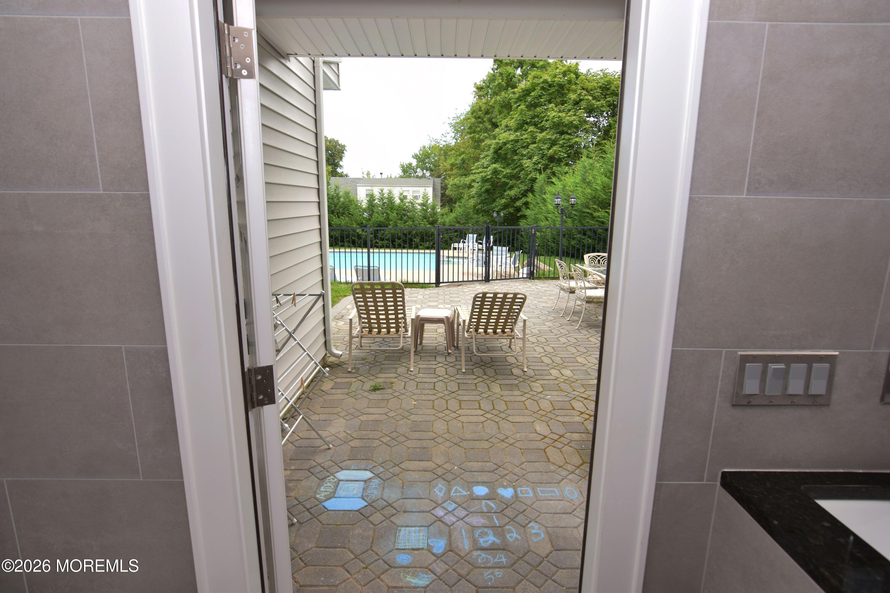 229 Lockwood Avenue, Unit WINTER Long Branch, NJ 07740 - Photo 15 of 19 a view of a balcony with chairs