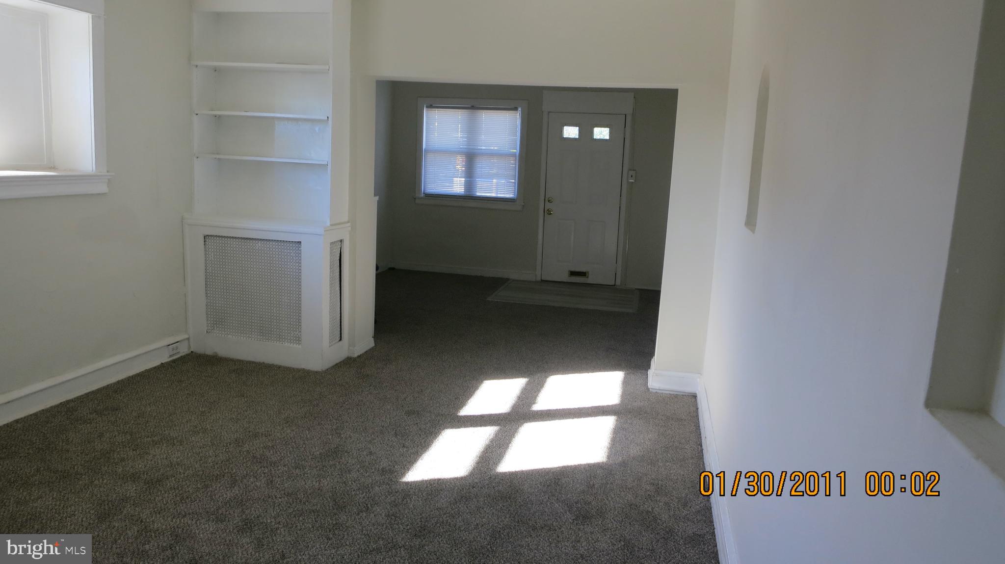5370 Lebanon Avenue Philadelphia, PA 19131 - Photo 4 of 15 Living Room thru Sun Porch