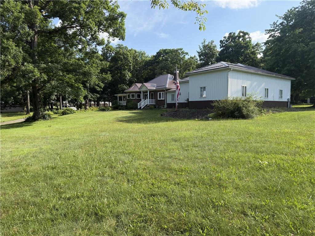644 Freeport Road Butler, PA 16002 - Photo 10 of 50 a front view of house with yard and trees