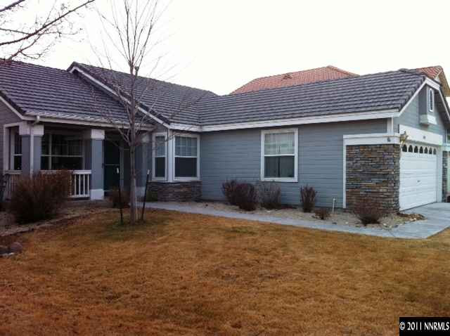 9638 Northrup Drive Reno, NV 89521 - Photo 1 of 1 a view of house with backyard and glass space