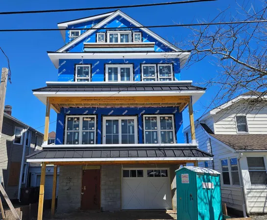 a front view of a house with a balcony