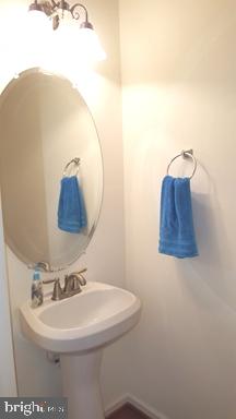 528 Van Dyke Circle Newark, DE 19702 - Photo 15 of 17 a bathroom with a sink and mirror