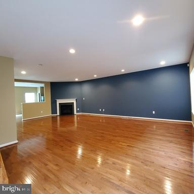 528 Van Dyke Circle Newark, DE 19702 - Photo 2 of 17 a view of an empty room with wooden floor