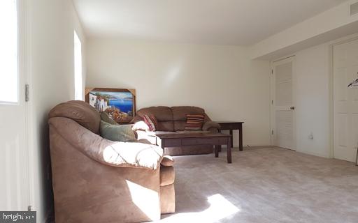 528 Van Dyke Circle Newark, DE 19702 - Photo 5 of 17 a bedroom with a bed and chair