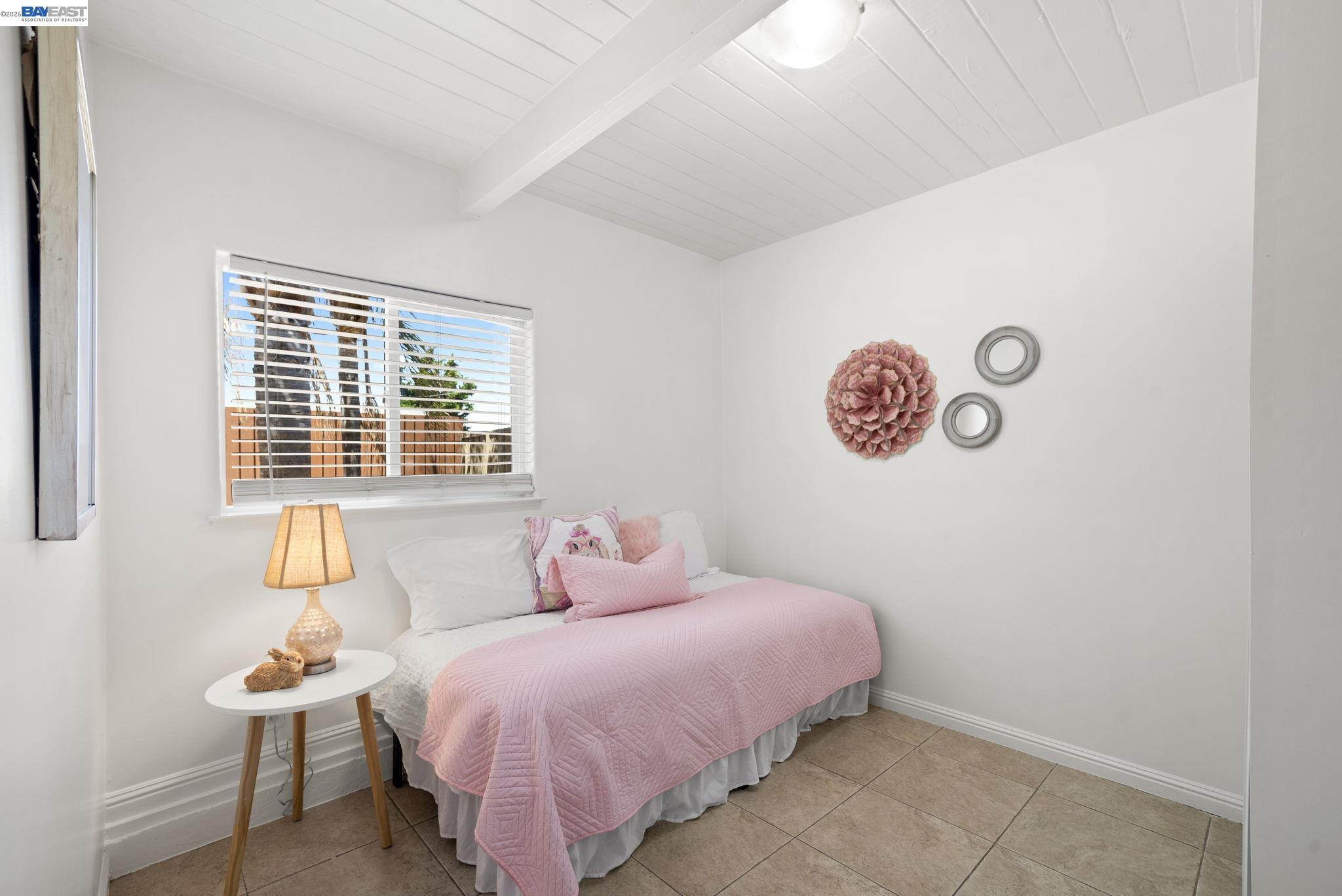 167 Peninsula Road Bay Point, CA 94565 - Photo 14 of 58 a bedroom with a bed and a window