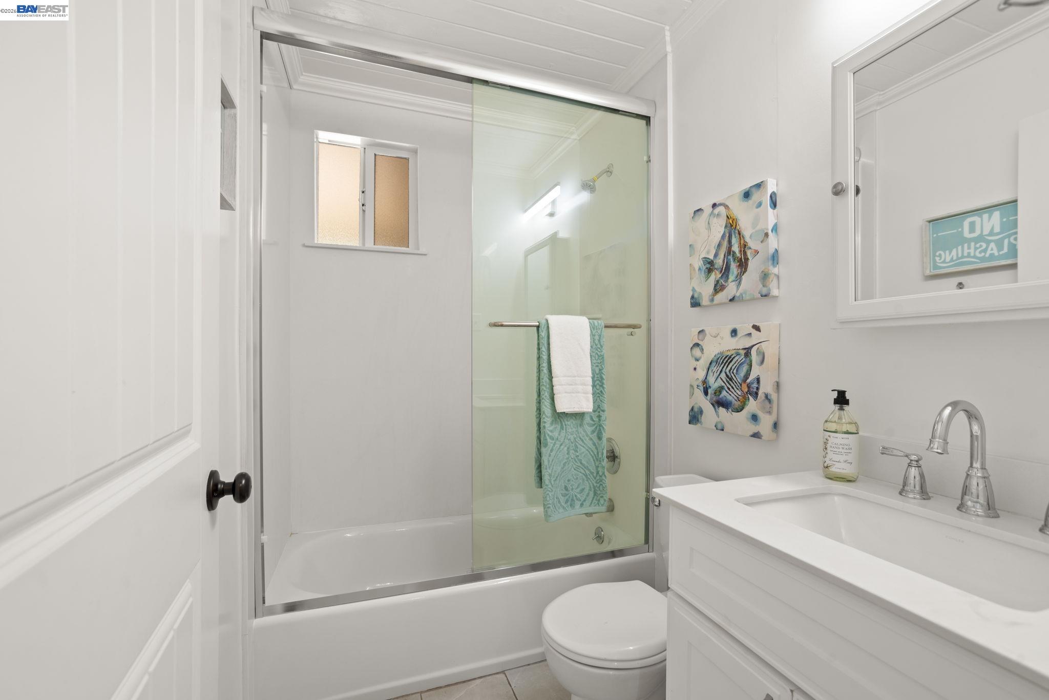 167 Peninsula Road Bay Point, CA 94565 - Photo 16 of 58 a bathroom with a granite countertop sink toilet and shower