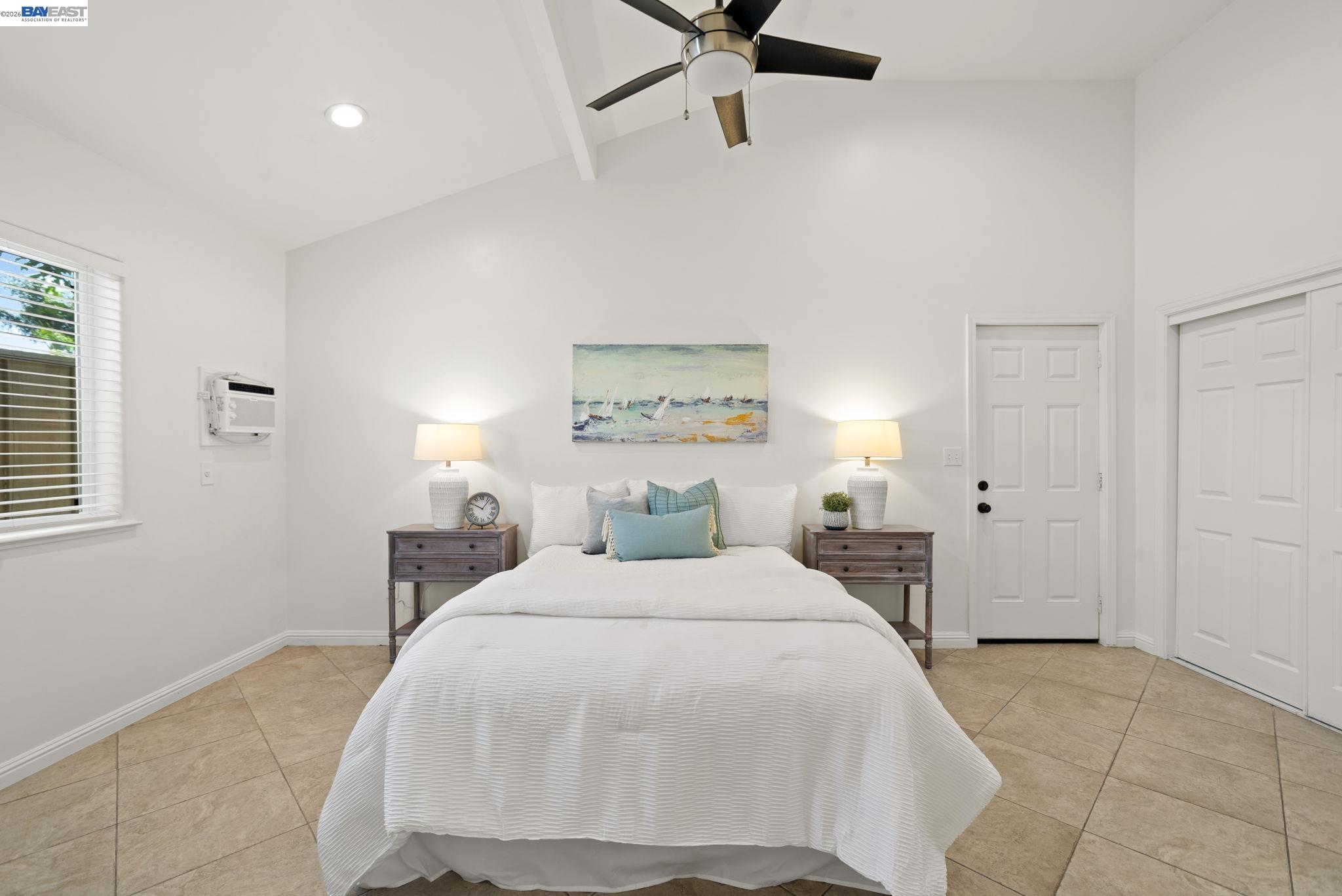 167 Peninsula Road Bay Point, CA 94565 - Photo 18 of 58 a bedroom with a bed and painting on the wall
