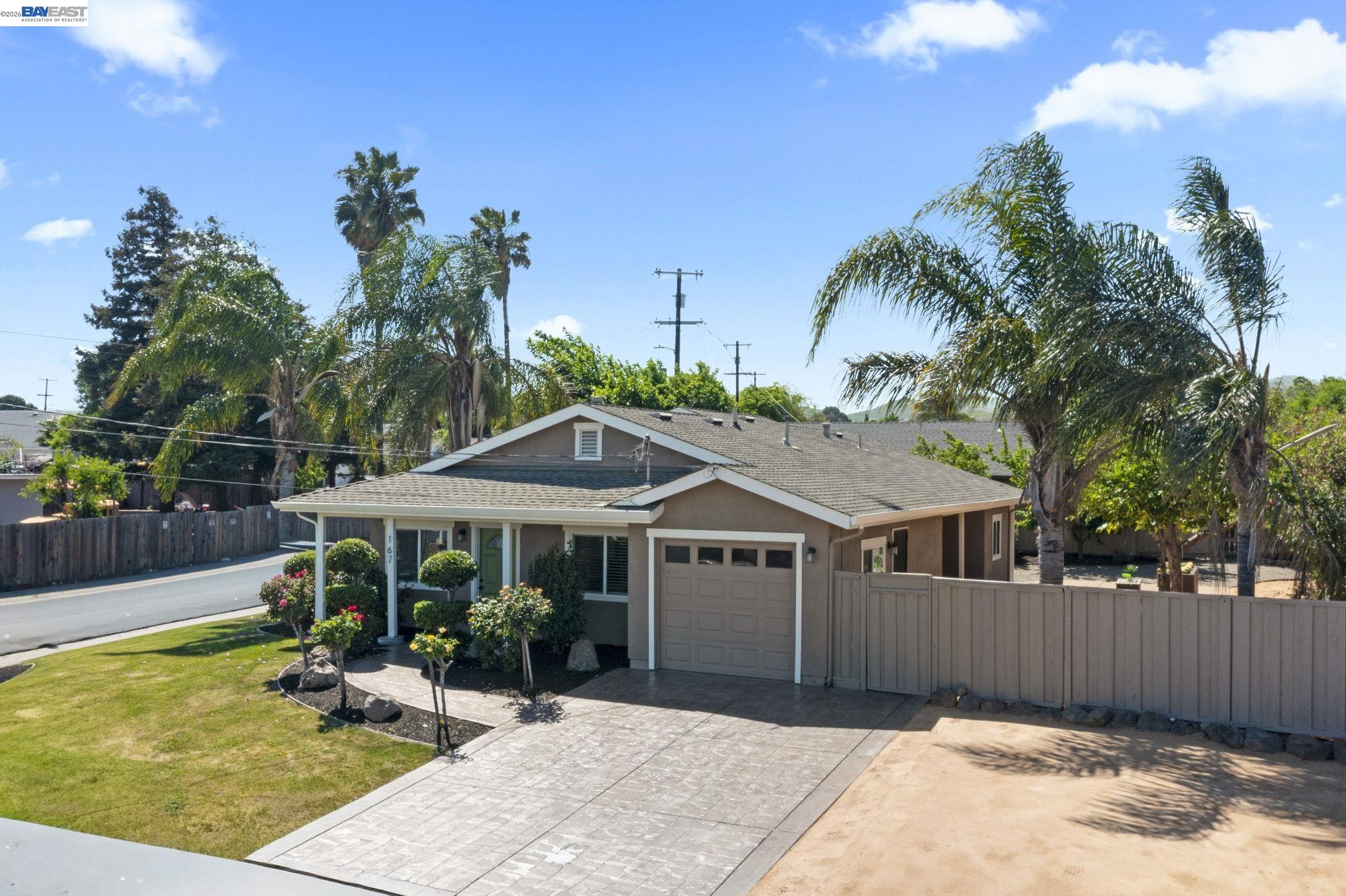 167 Peninsula Road Bay Point, CA 94565 - Photo 2 of 58 a front view of a house with garden