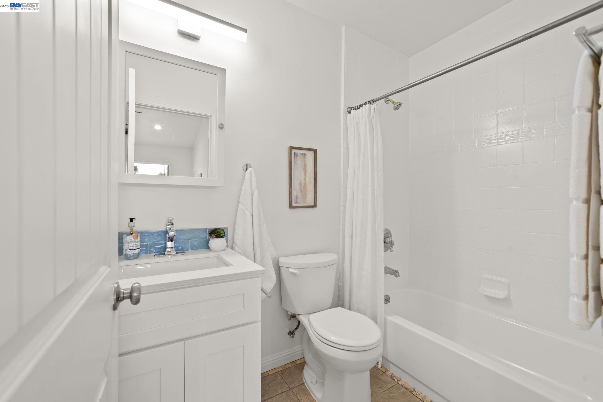167 Peninsula Road Bay Point, CA 94565 - Photo 21 of 58 a bathroom with a sink toilet and shower