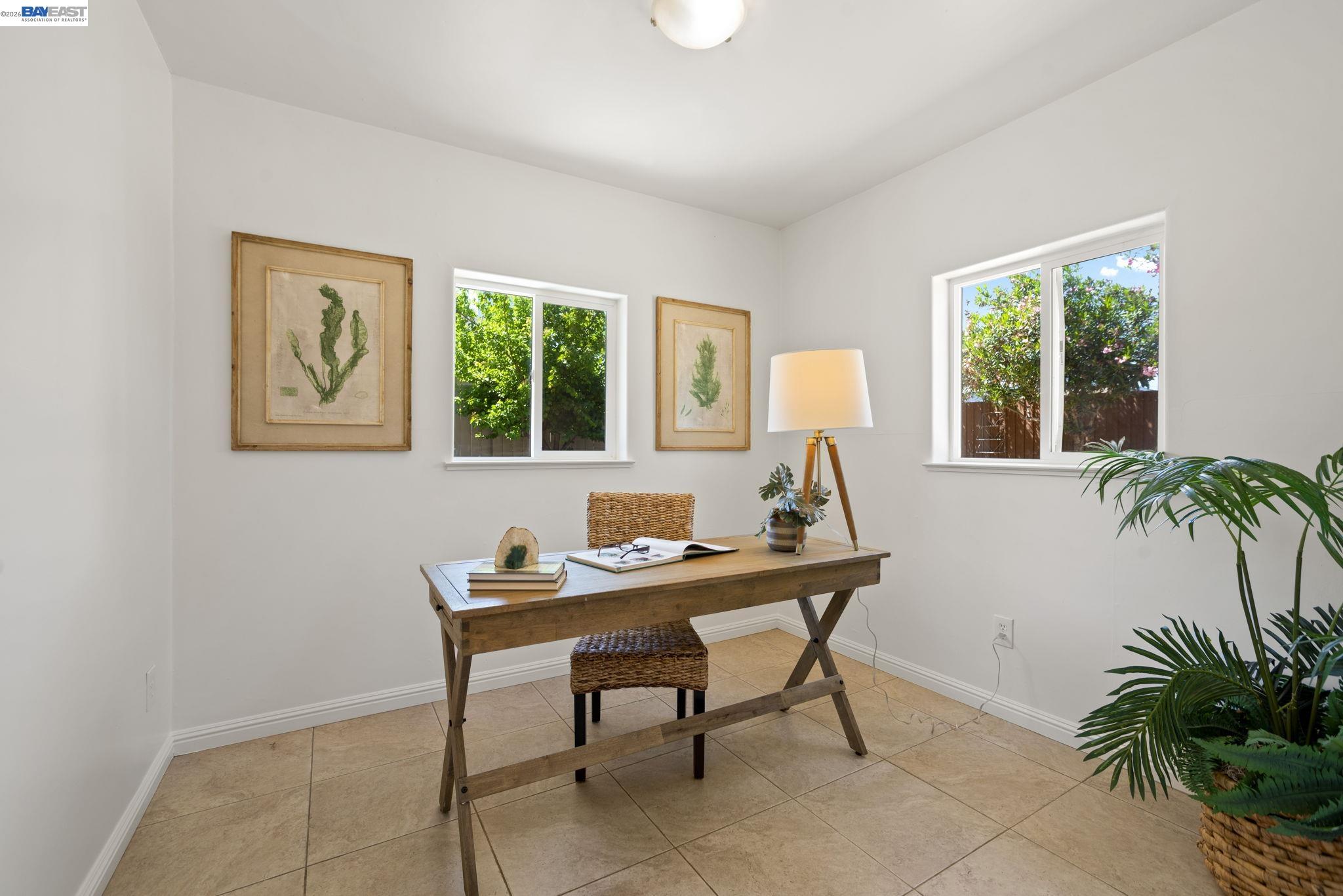 167 Peninsula Road Bay Point, CA 94565 - Photo 25 of 58 a workspace with furniture and a potted plant