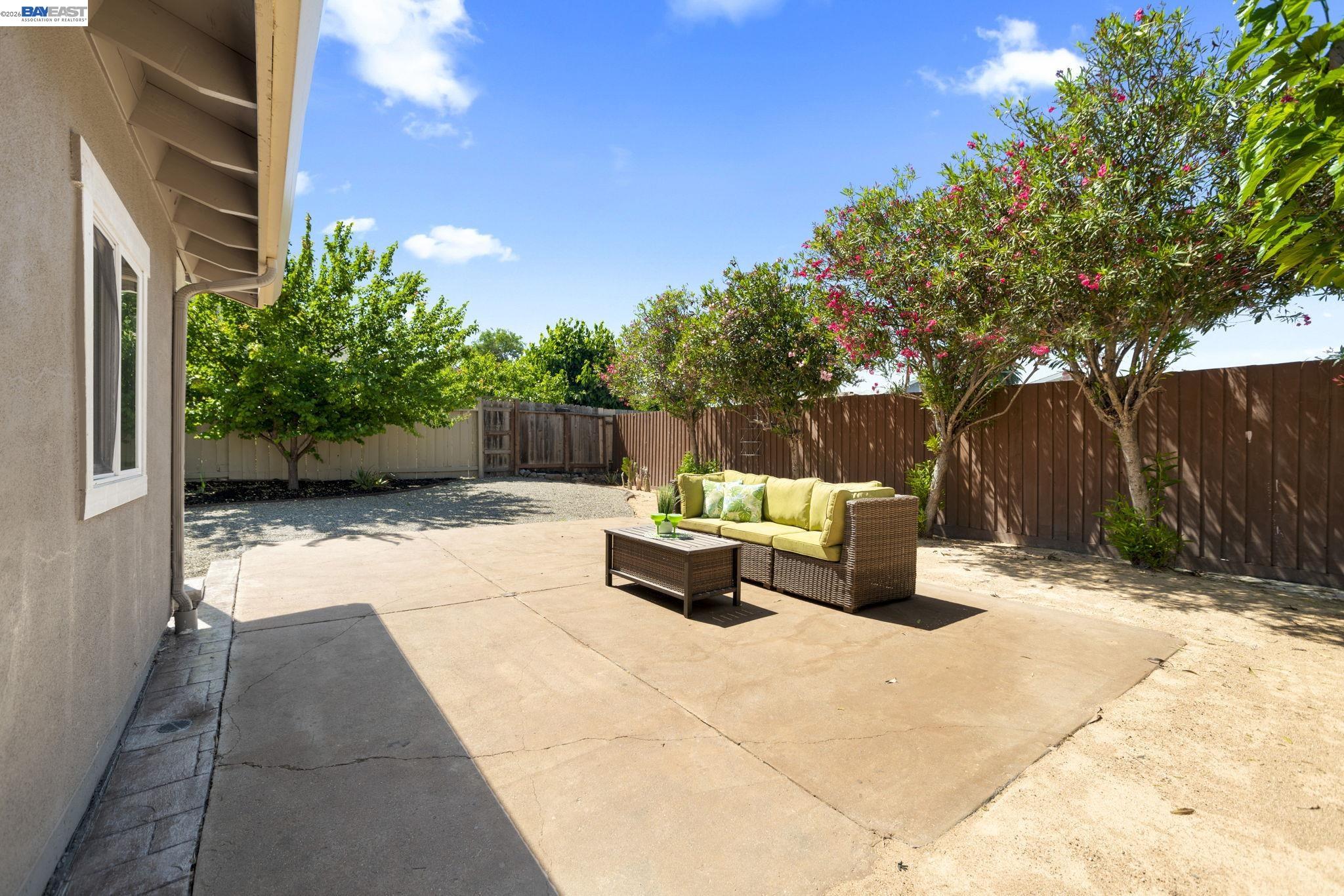 167 Peninsula Road Bay Point, CA 94565 - Photo 29 of 58 a view of patio with table and chairs and potted plants