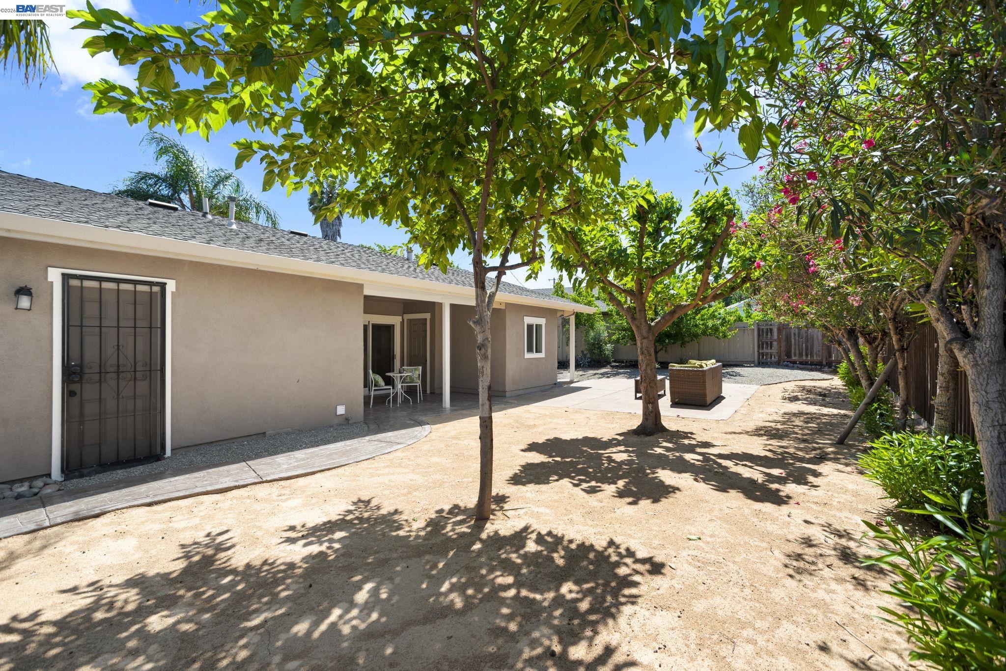 167 Peninsula Road Bay Point, CA 94565 - Photo 30 of 58 a house with trees in front of it