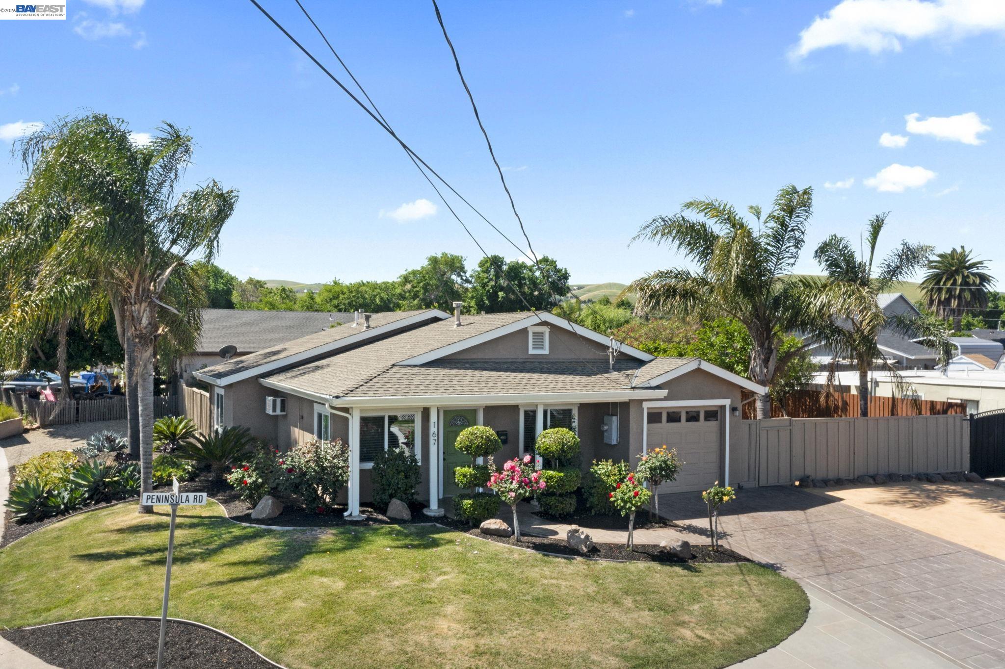 167 Peninsula Road Bay Point, CA 94565 - Photo 3 of 58 a view of a house with swimming pool and sitting area