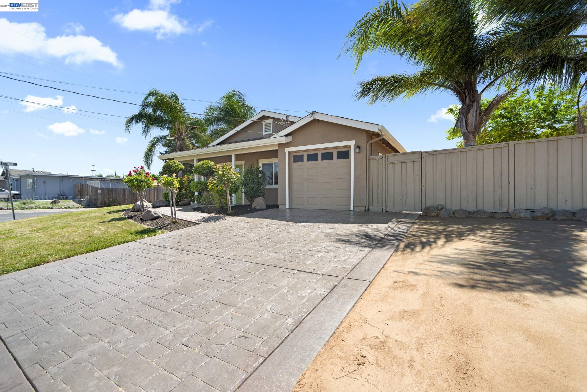 167 Peninsula Road Bay Point, CA 94565 - Photo 33 of 58 a front view of a house with a yard and potted plants