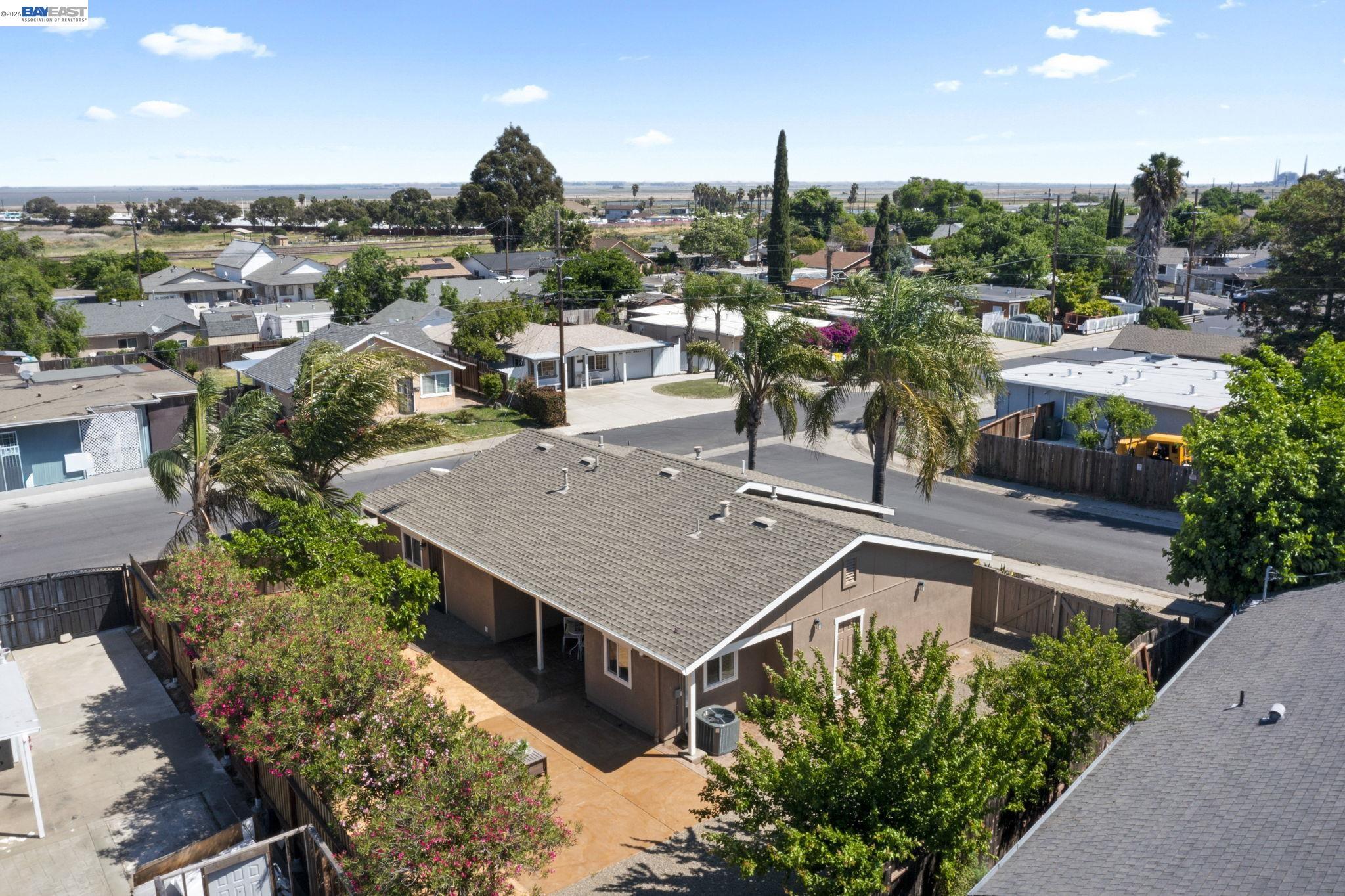 167 Peninsula Road Bay Point, CA 94565 - Photo 56 of 58 an aerial view of a house with a yard and lake view