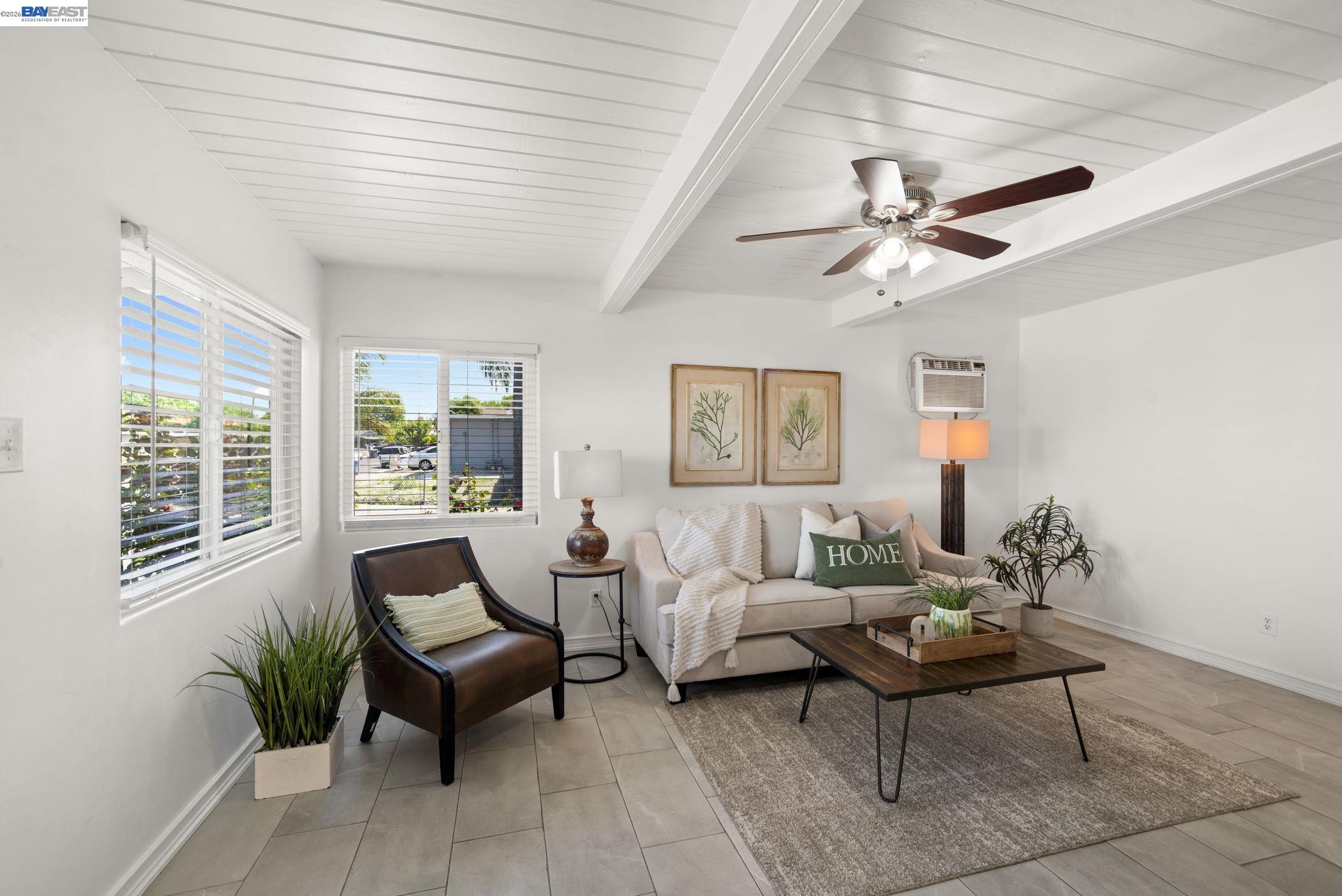 167 Peninsula Road Bay Point, CA 94565 - Photo 6 of 58 a living room with furniture and a large window