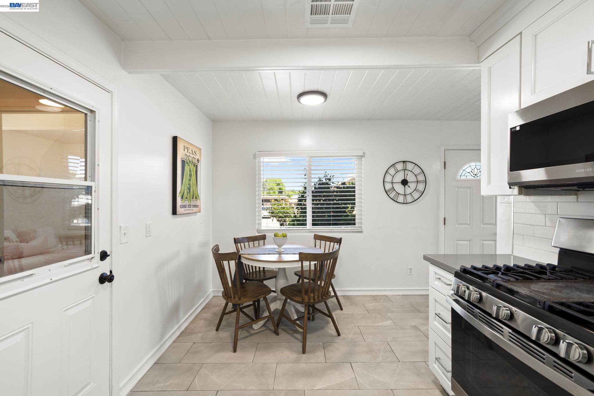 167 Peninsula Road Bay Point, CA 94565 - Photo 9 of 58 a view of a dining room with furniture and a window