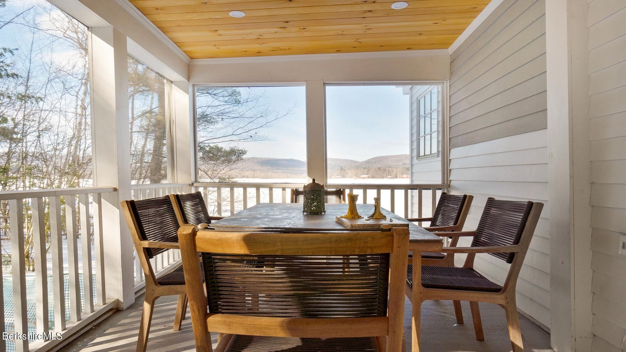 42 Lake Rd Extension Richmond, MA 01201 - Photo 18 of 47 a view of a dining room with furniture window and outside view