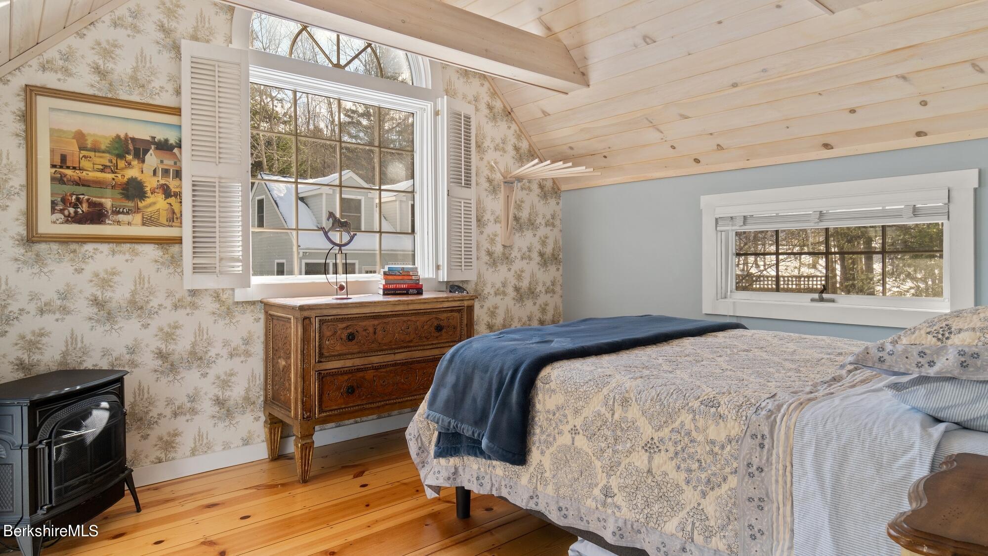 42 Lake Rd Extension Richmond, MA 01201 - Photo 25 of 47 a bedroom with a bed and a window