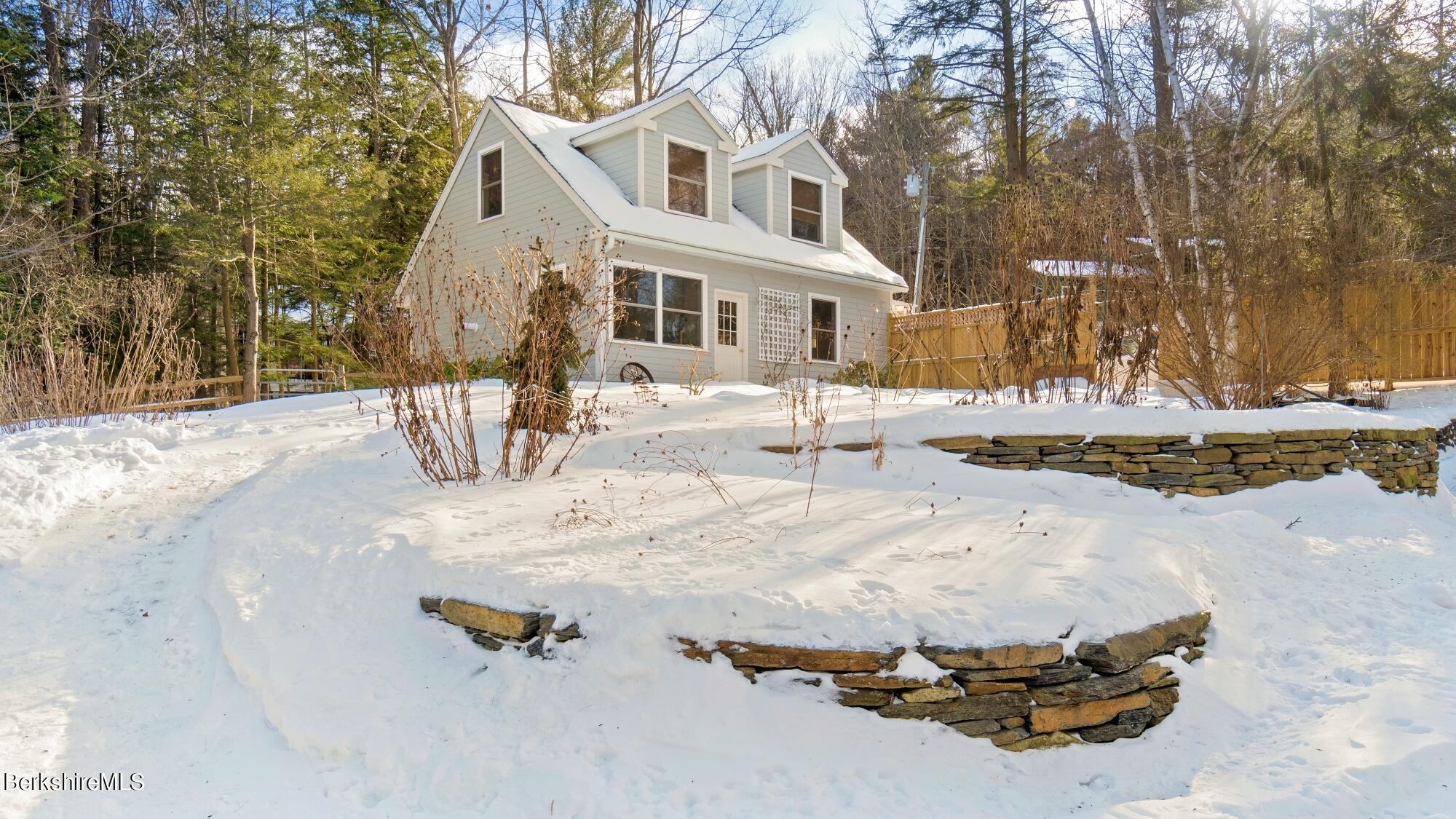 42 Lake Rd Extension Richmond, MA 01201 - Photo 31 of 47 a view of a house with snow on the road
