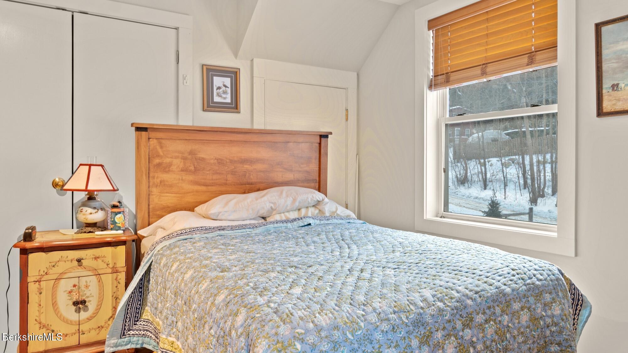 42 Lake Rd Extension Richmond, MA 01201 - Photo 34 of 47 a bedroom with a bed and a window