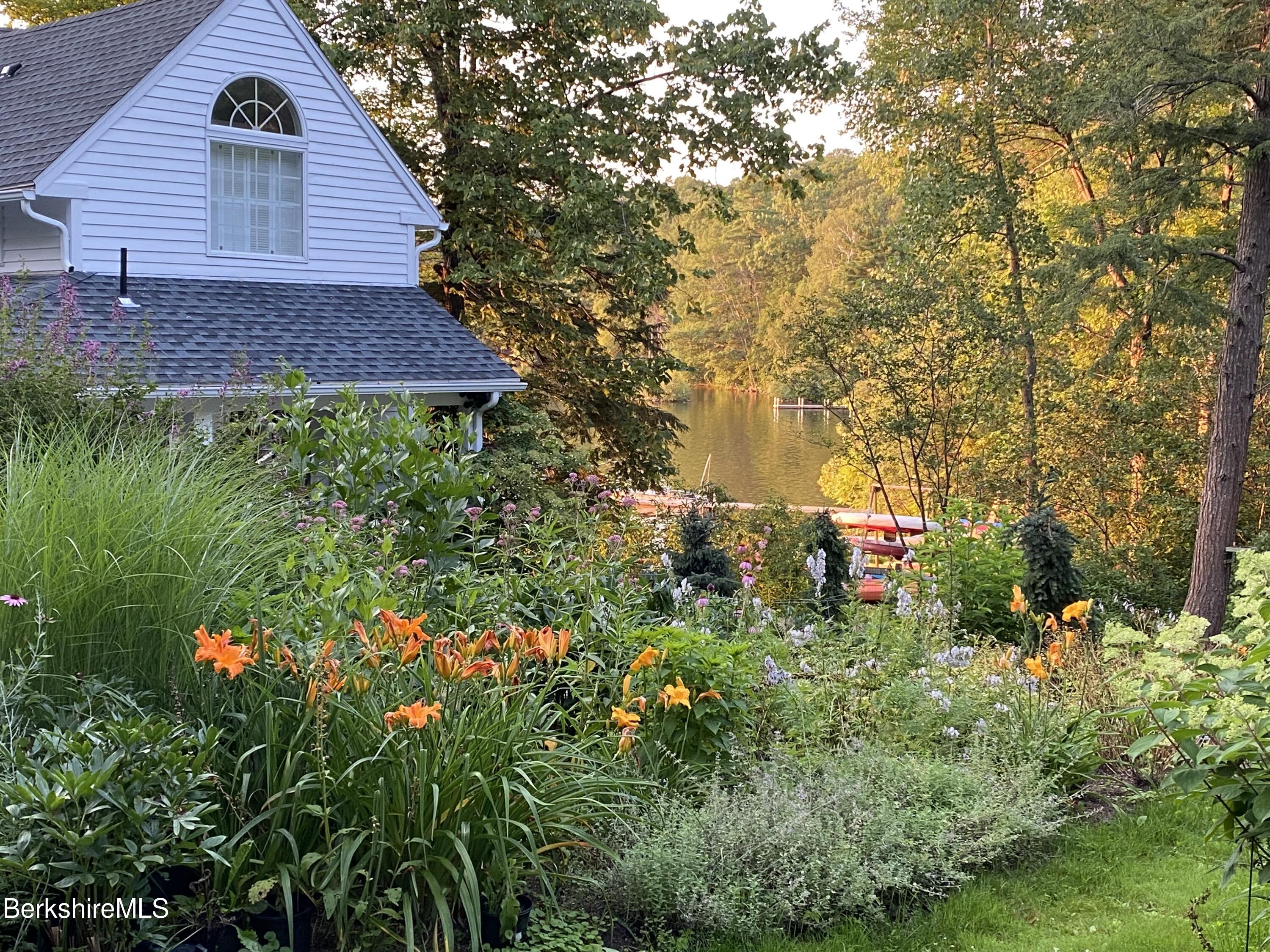 42 Lake Rd Extension Richmond, MA 01201 - Photo 35 of 47 a view of a house with a yard and garden