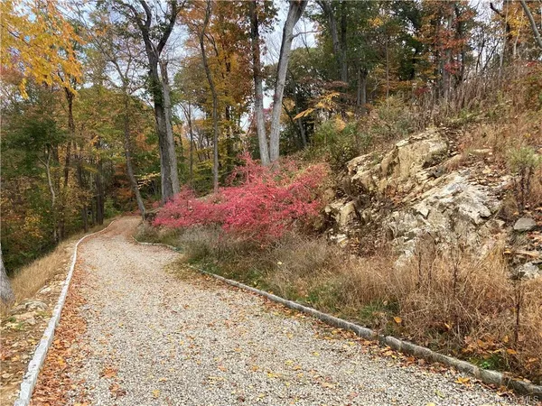 a view of a backyard of the house
