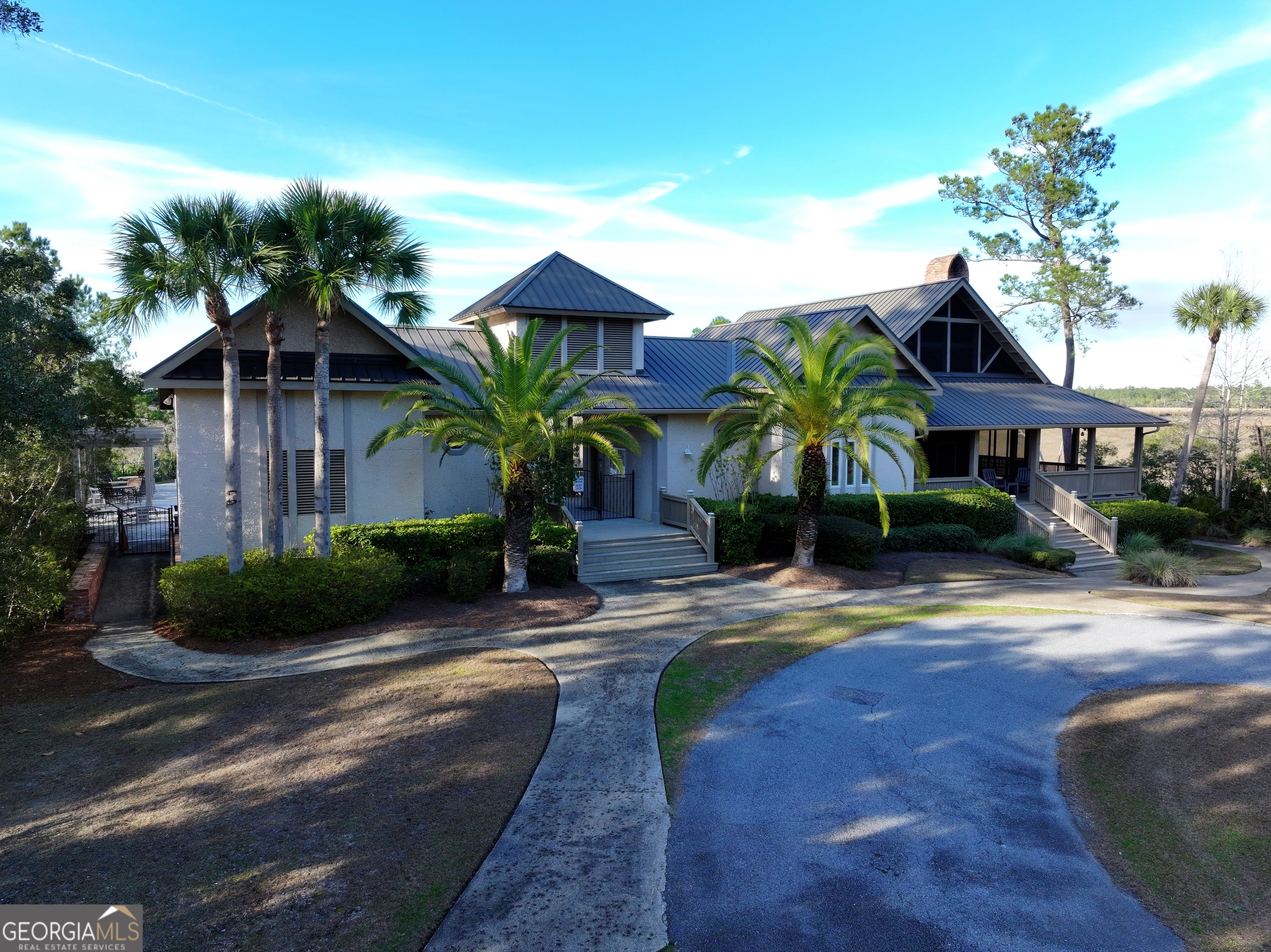 0 Merlin Court Waverly, GA 31565 - Photo 17 of 22 a front view of house with yard and green space
