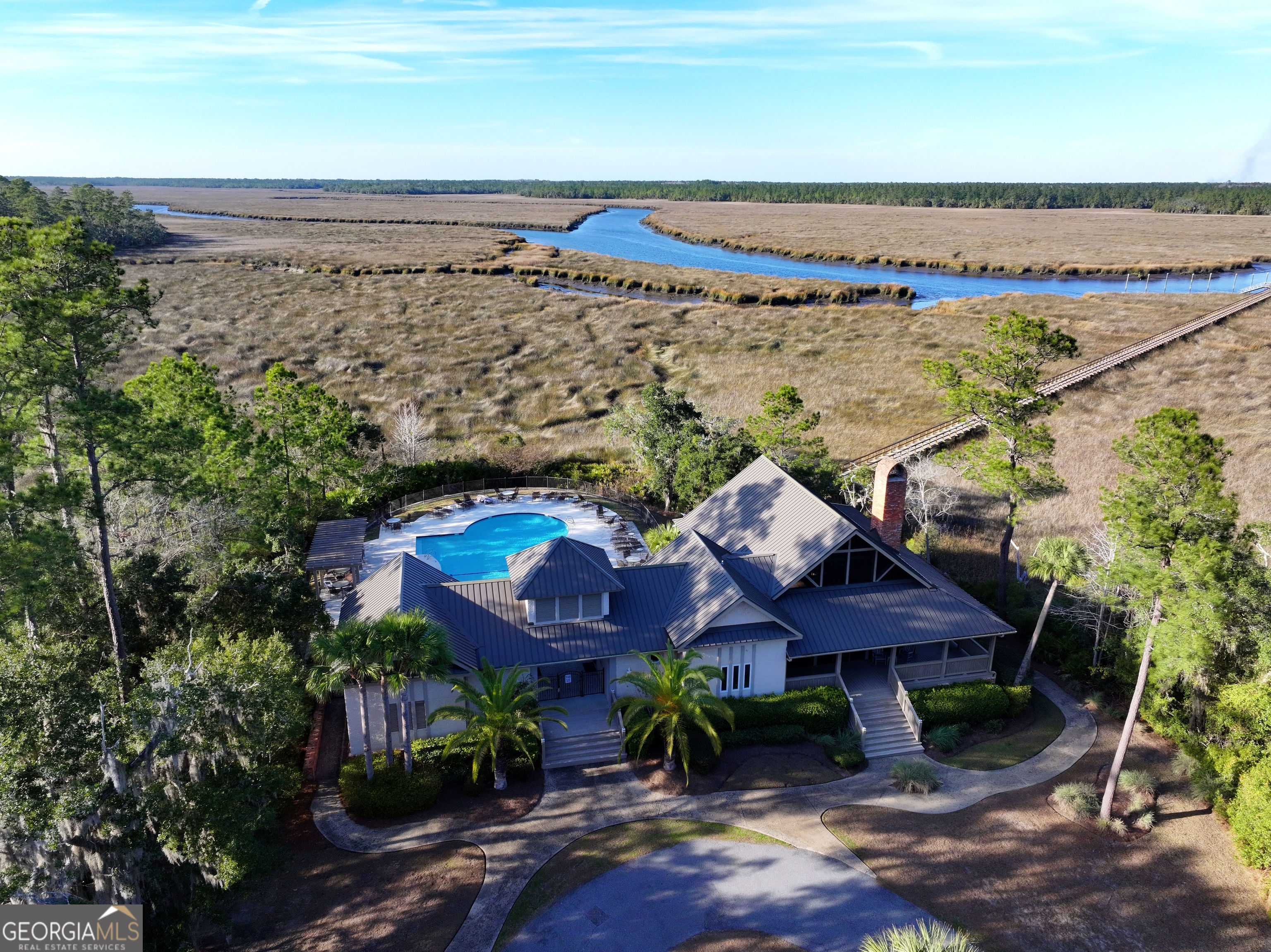 0 Merlin Court Waverly, GA 31565 - Photo 19 of 22 a aerial view of a house with a garden and lake view