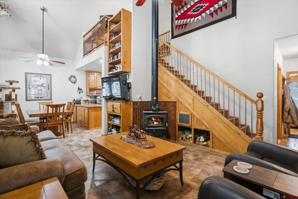 a living room with furniture and a table