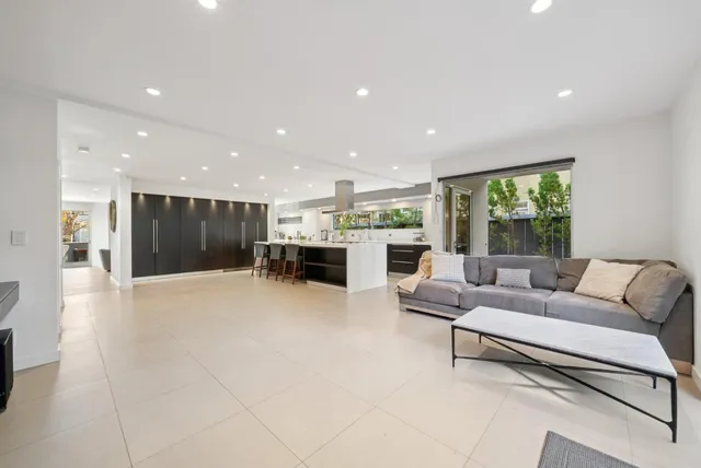 a room with a dresser and a window