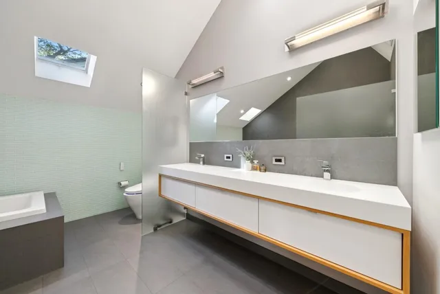 a view of a backyard of the house