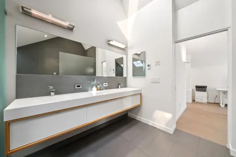 a view of a backyard of the house