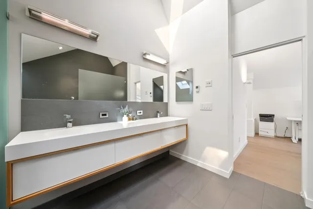 a view of a backyard of the house