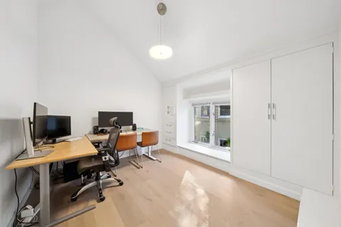 a view of a back yard of the house