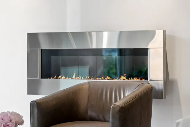 a kitchen with a sink and a stove top oven