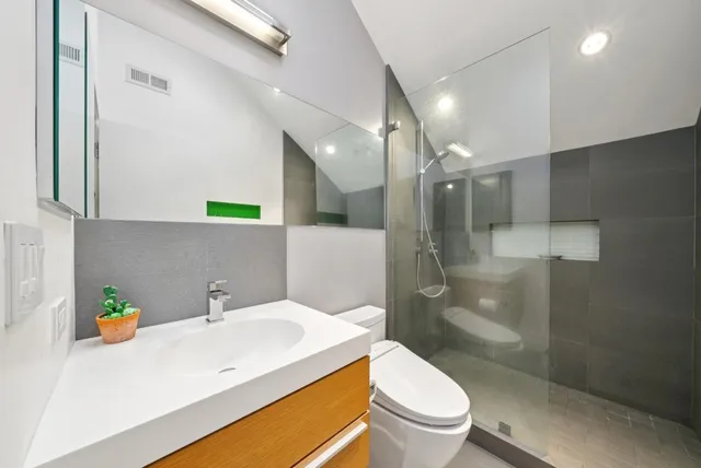 a view of a tall brick wall