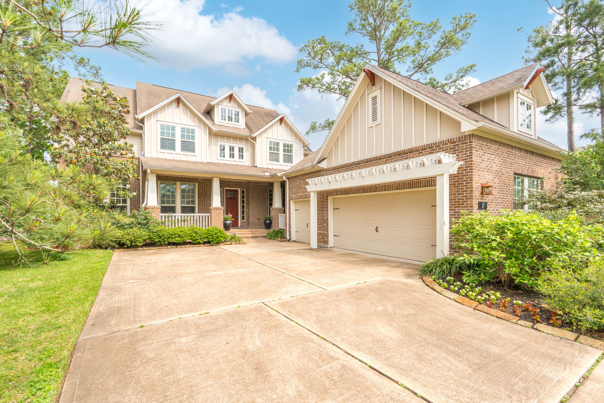 27 Hedgedale Way Spring, TX 77389 - Photo 1 of 49 a front view of a house with a garden and entryway