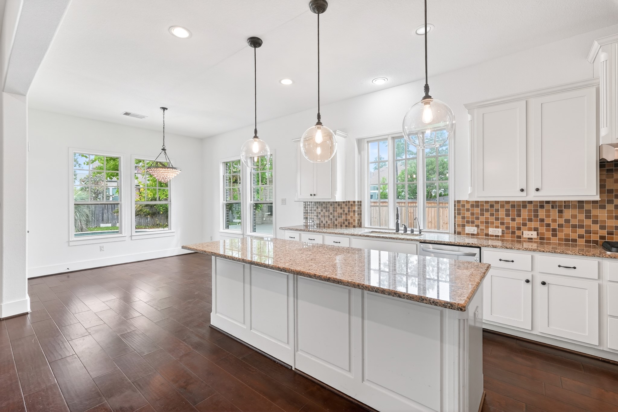 27 Hedgedale Way Spring, TX 77389 - Photo 21 of 49 a large kitchen with granite countertop a large window