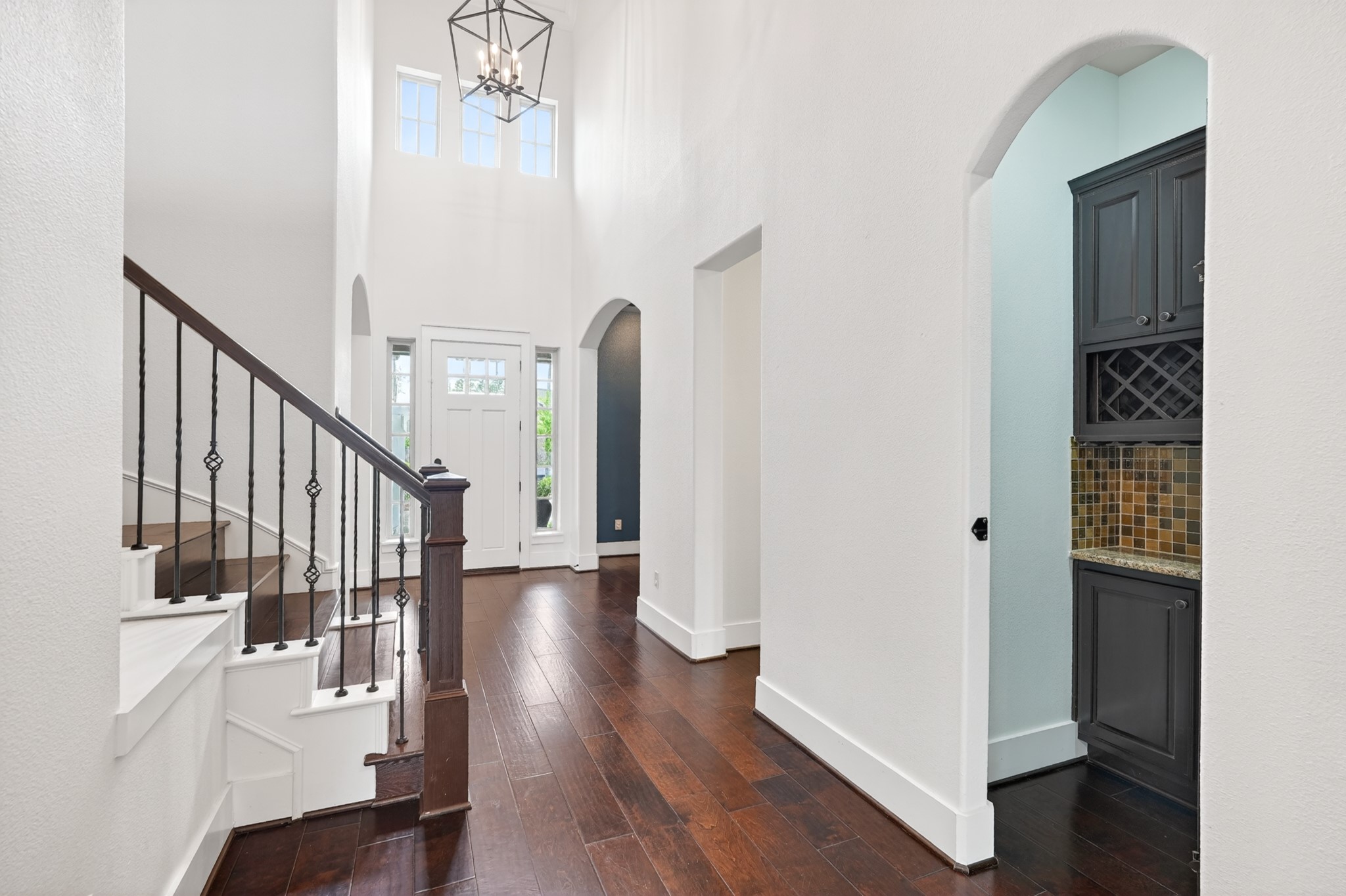 27 Hedgedale Way Spring, TX 77389 - Photo 26 of 49 a view of a hallway with wooden floor and staircase