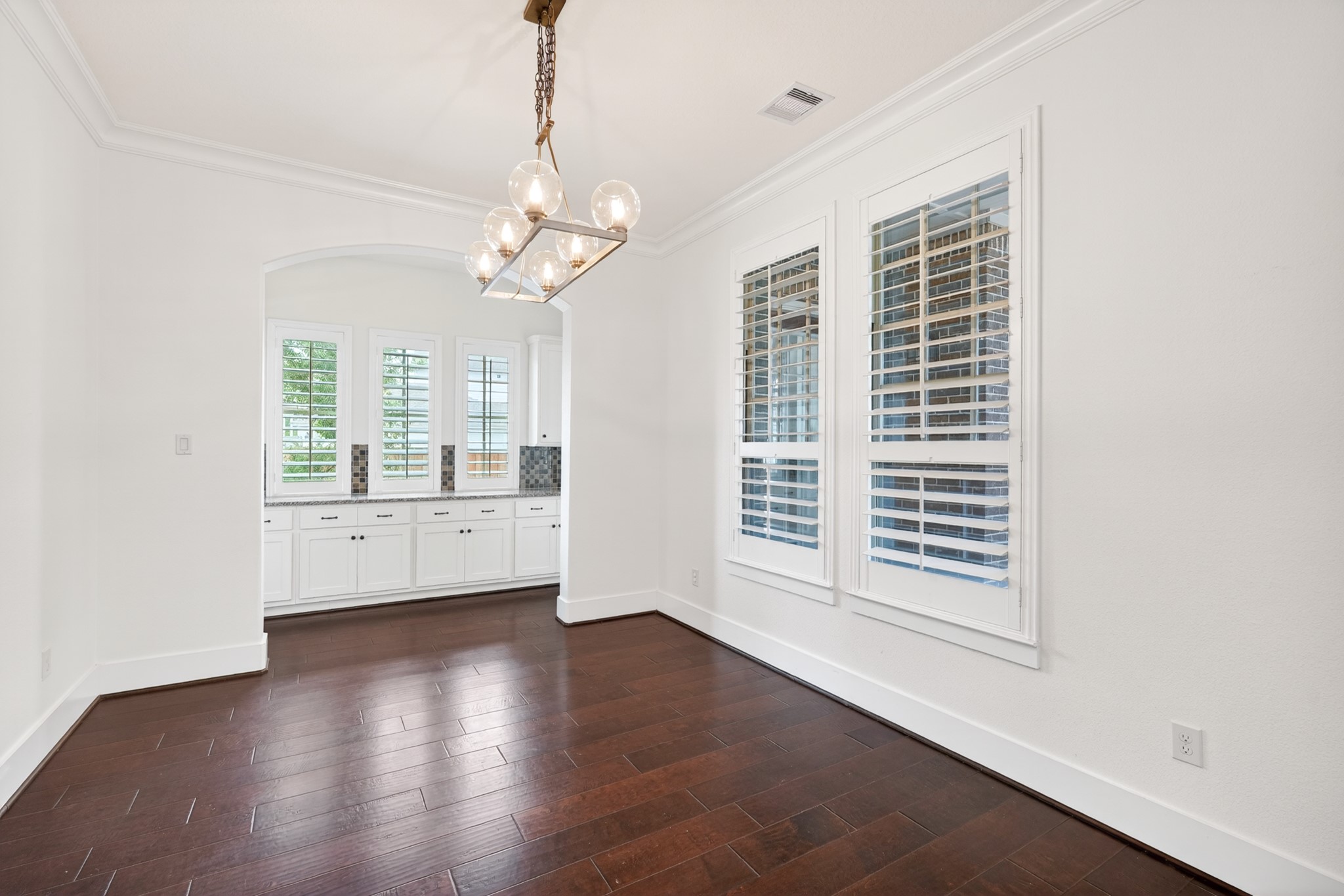 27 Hedgedale Way Spring, TX 77389 - Photo 8 of 49 a view of an empty room with wooden floor and a window