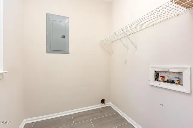 a view of a small space with racks on the wall