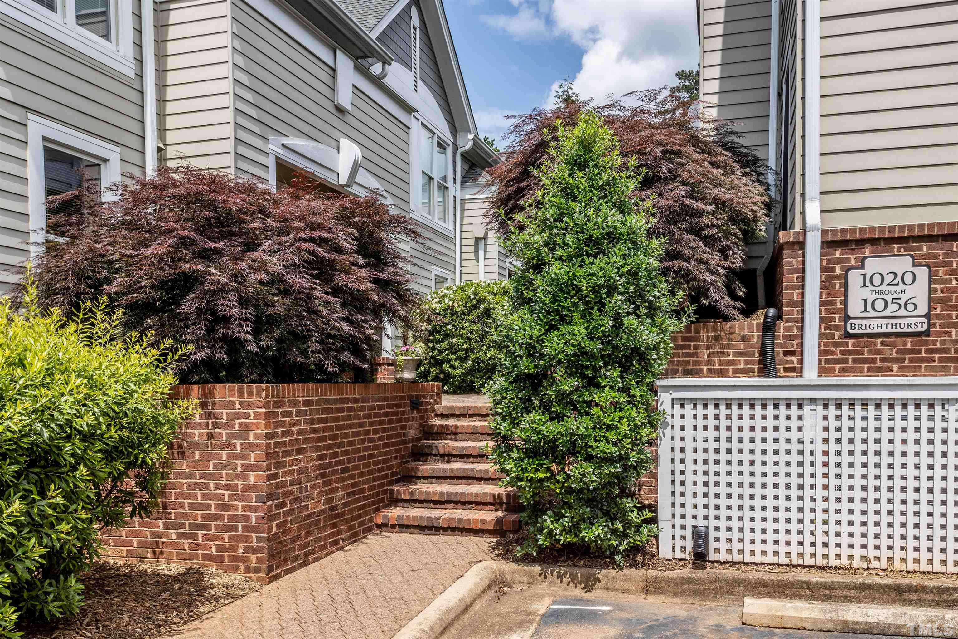 1024 Brighthurst Drive, Unit 1024 Raleigh, NC 27605 - Photo 28 of 30 a view of a brick building