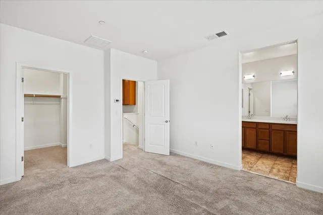 a bathroom with a sink a mirror and a shower