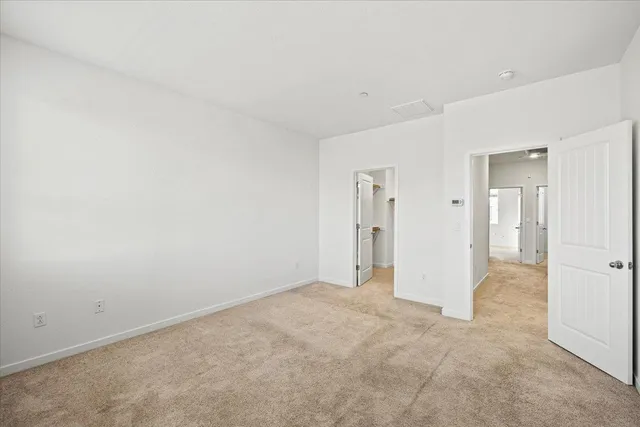 a view of a storage and utility room in empty room